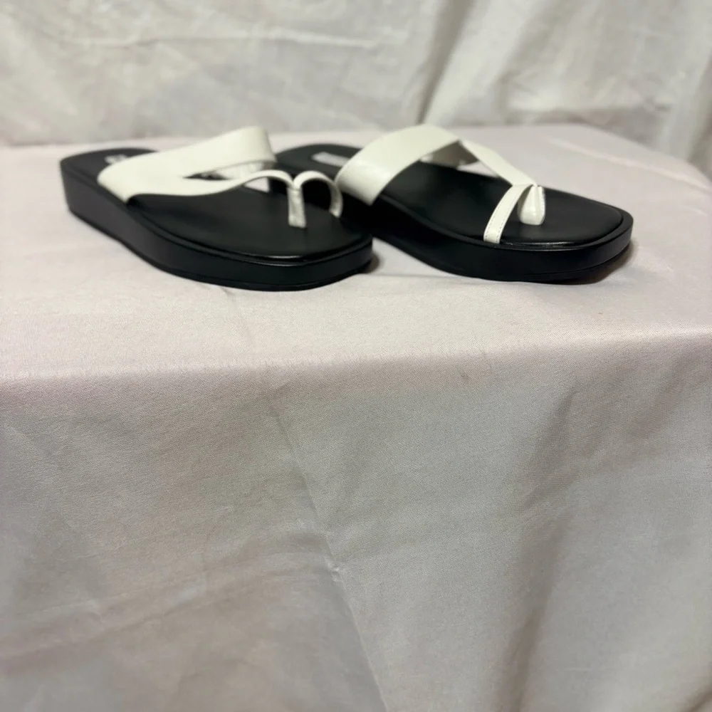 Saks Fifth Avenue round toe-strap platform leather sandals in black and white.